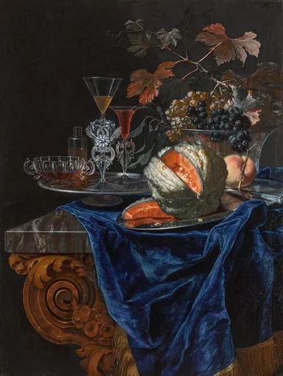 Still life with a melon and a peach on a silver platter, with a glass bowl of grapes and assorted glassware by Christian…