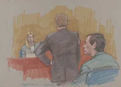 A woman on the stand in the trial of Allen Blackthorne, who was tried for conspiracy in the homicide of his ex-wife by…