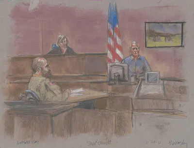 Defendant Nidal Malik Hasan during his court martial with witness Stephen Bennett and judge by Brigitte Woosley, 2013 —…