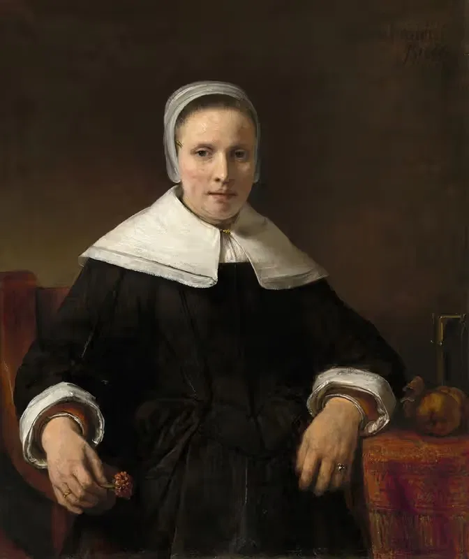A Woman Holding a Pink — Rembrandt van Rijn