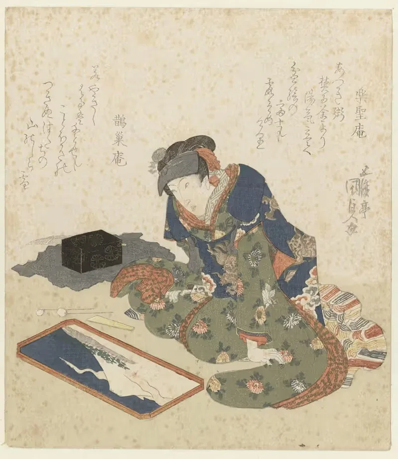 Woman making a sand painting — Utagawa Kunisada (Toyokuni III)