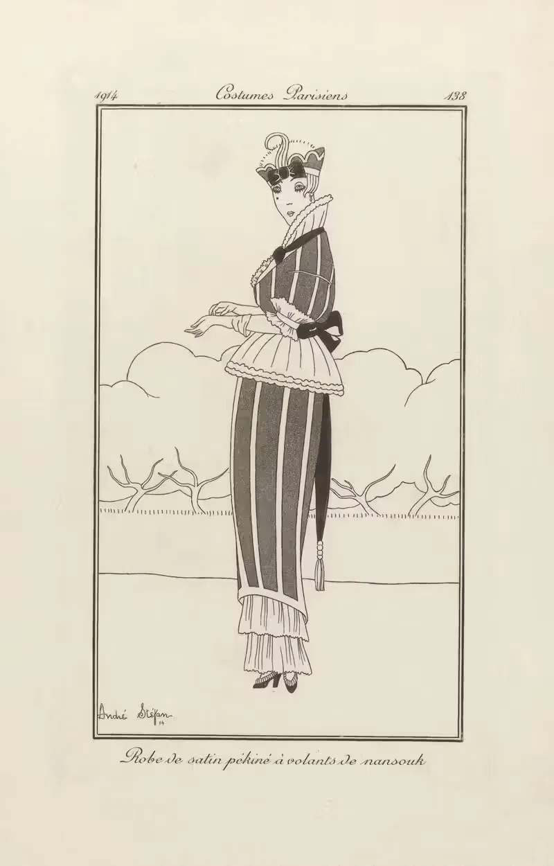 Robe de satin pékiné à volants de nansouk — André Stéfan