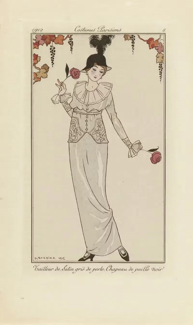 Tailleur de Satin gris de perle. Chapeau de paille noir. — George Barbier