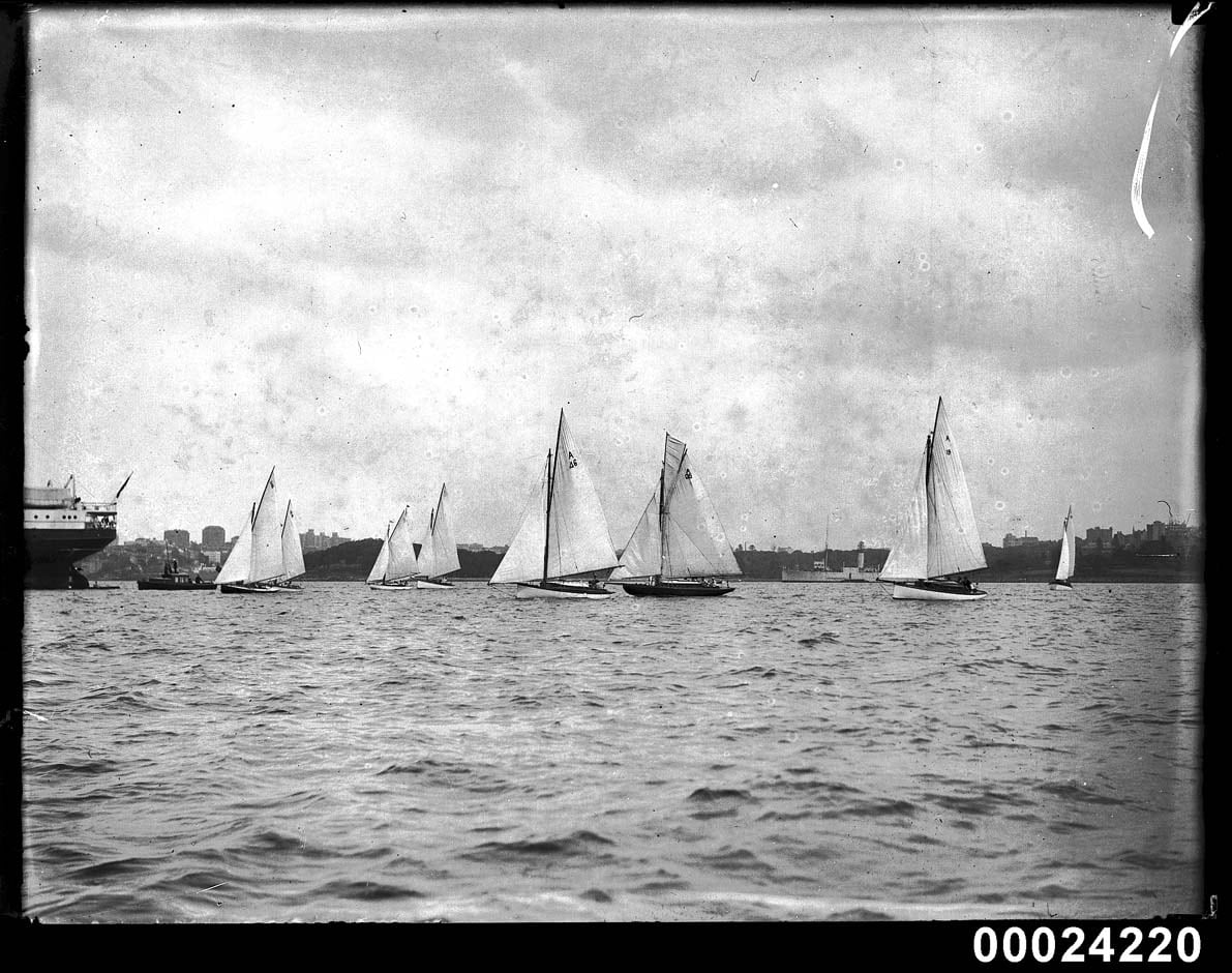 Sailing boats with crew and dinghies on Sydney Harbour by Sam Hood, 1925 — digital art print download