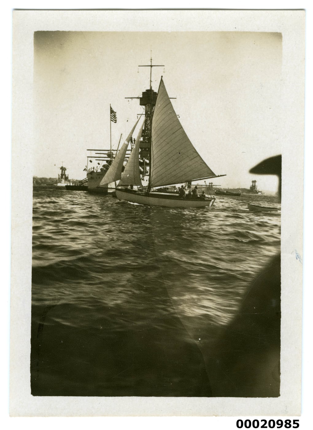Sailing boat with United States Navy battleship behind in Sydney Harbour by Sam Hood, 1925 — digital art print download